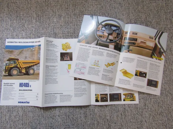 2 Prospekte Komatsu HD325-6 HD465-5 Muldenkipper um 1992