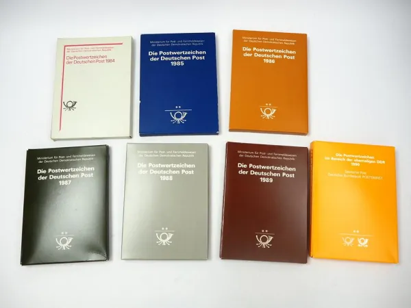 7x Jahrbücher Die Postwertzeichen der Deutschen Post Briefmarken DDR 1984 - 1990