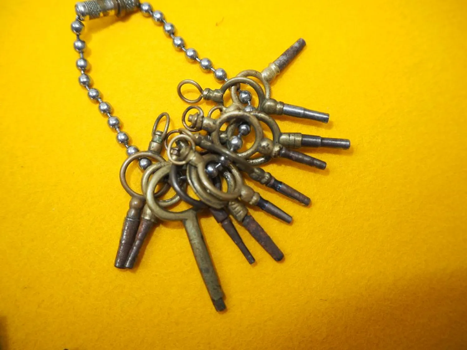 12 alte Aufziehschlüssel und Stern für Taschenuhren Spindeluhren ca. 1860/1920