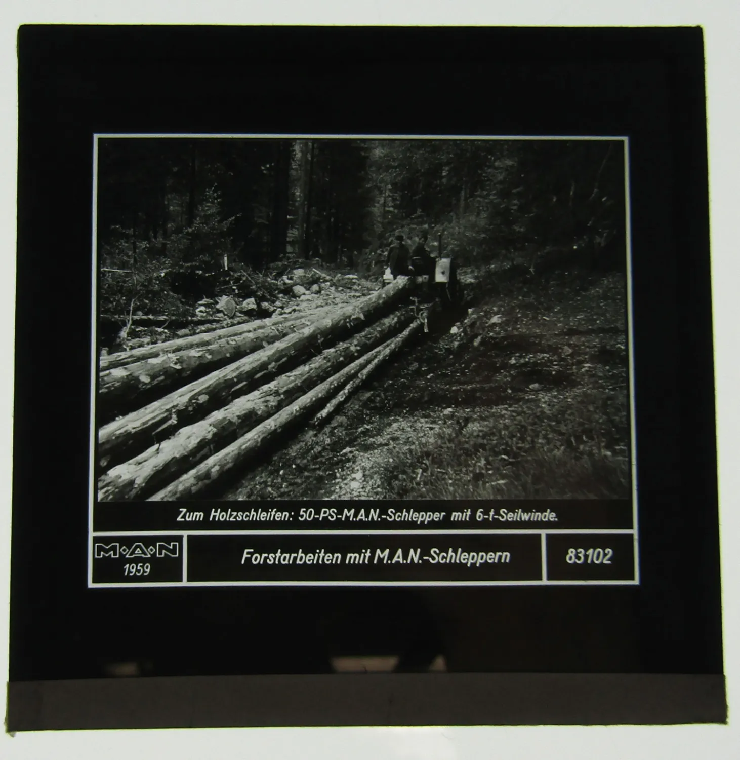2 Diapositiv MAN Dieselschlepper 50PS mit Seilwinde Forst ca 1960 Original