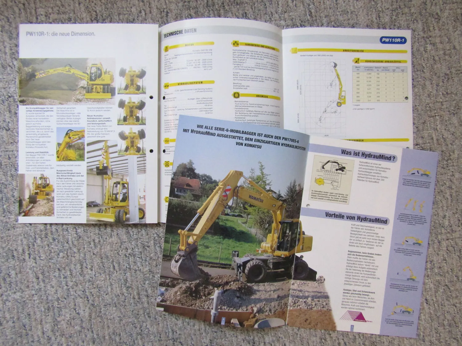 5 Prospekte Komatsu PW 110R-1 170ES-6 130ES-6 95R-2 und PW75R-2 Bagger