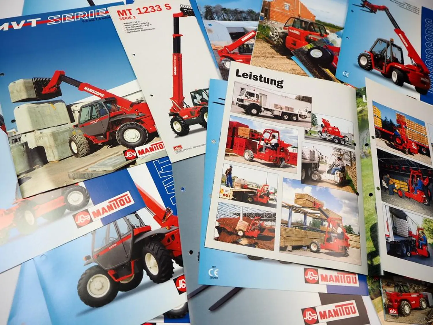 59 Prospekte Manitou Maniscopic Teleskoplader & Frontlader TMT MLA MT MVT MRT MC