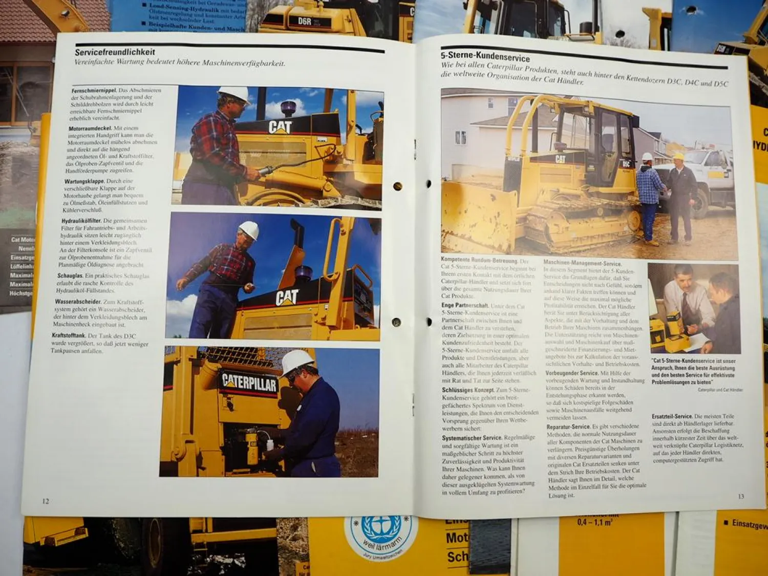 Posten mit ca. 25x Prospekt Zeppelin CAT Bagger Radlader Raupen meist 1990er J.